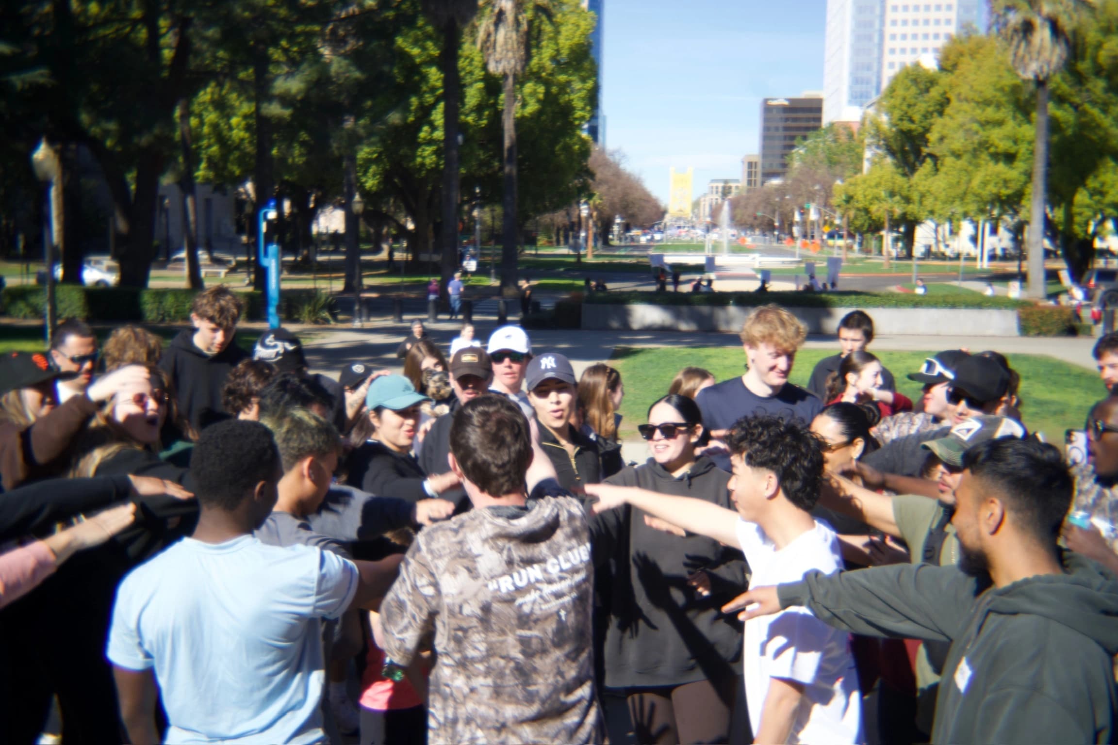 Group huddle hands in