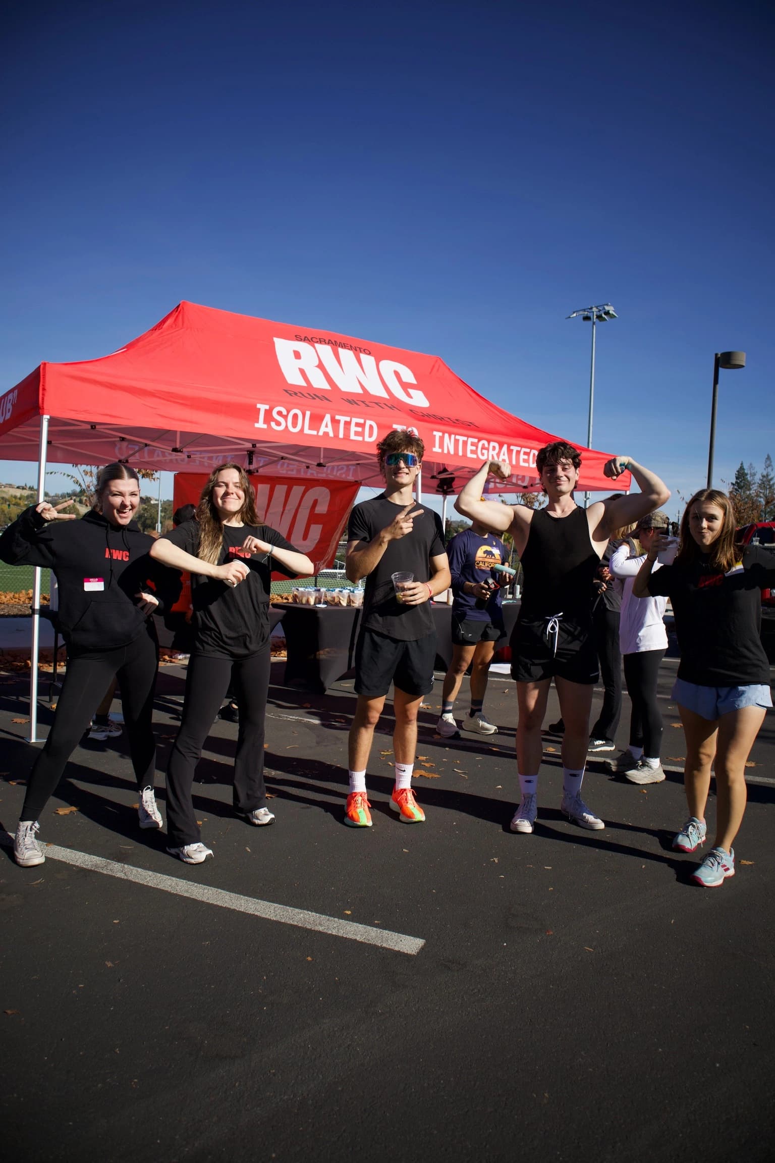 Group pose at RWC tent